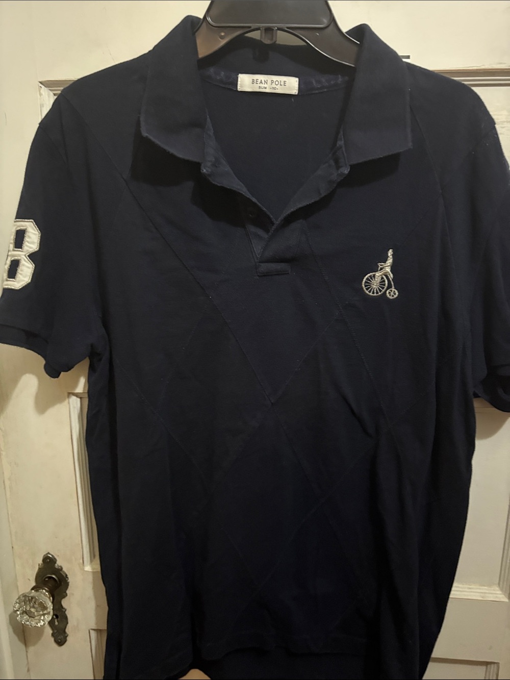 Men's Navy Polo with Embroidered Bicycle Logo